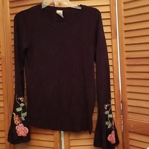 Black shirt with embroidered bell sleeves